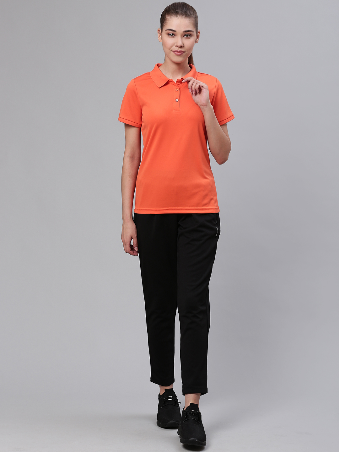 Alcis Women Orange Solid Polo Collar Sports T-shirt (4)