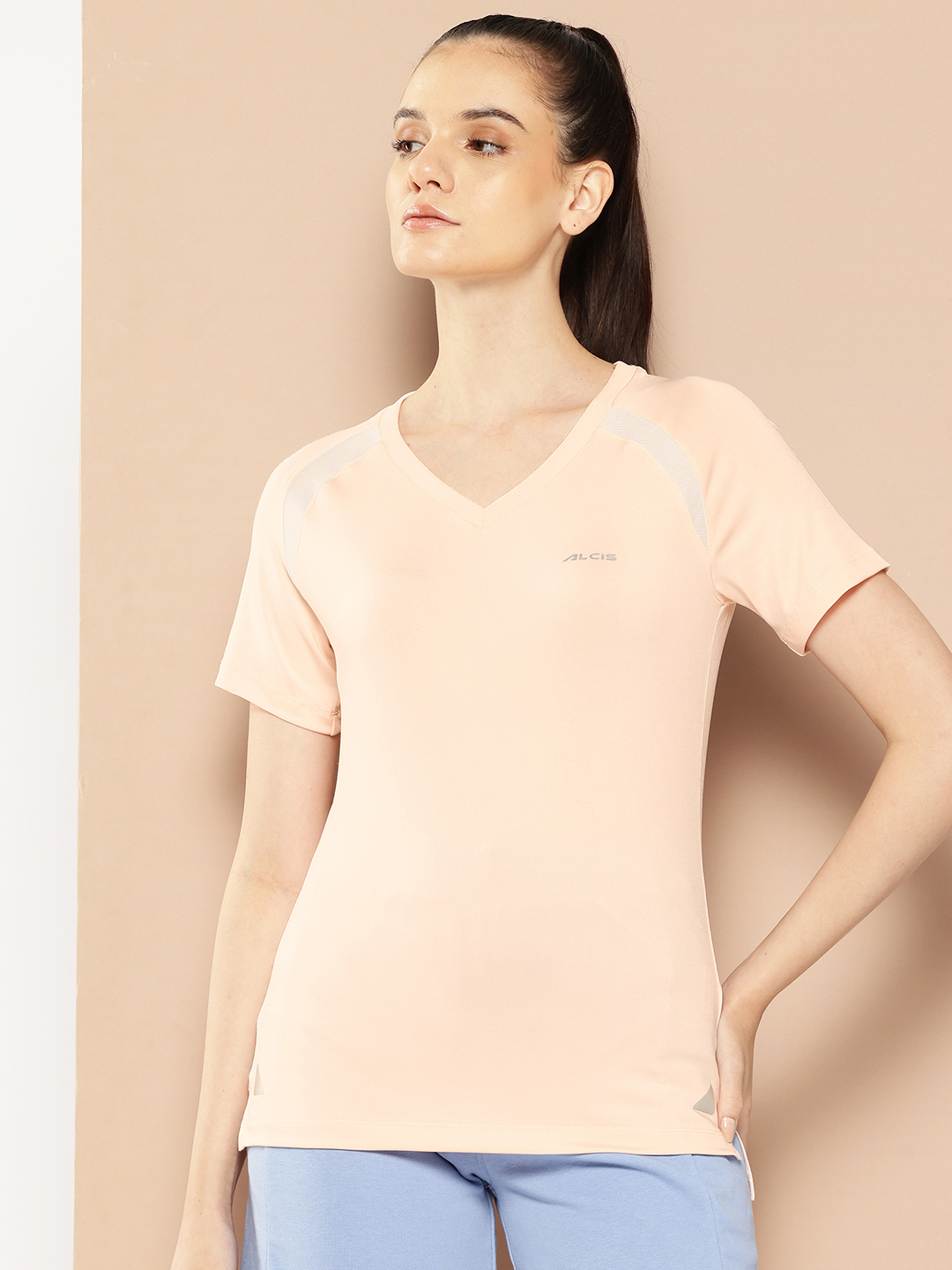 Women Peach-Coloured Solid Training T-shirt