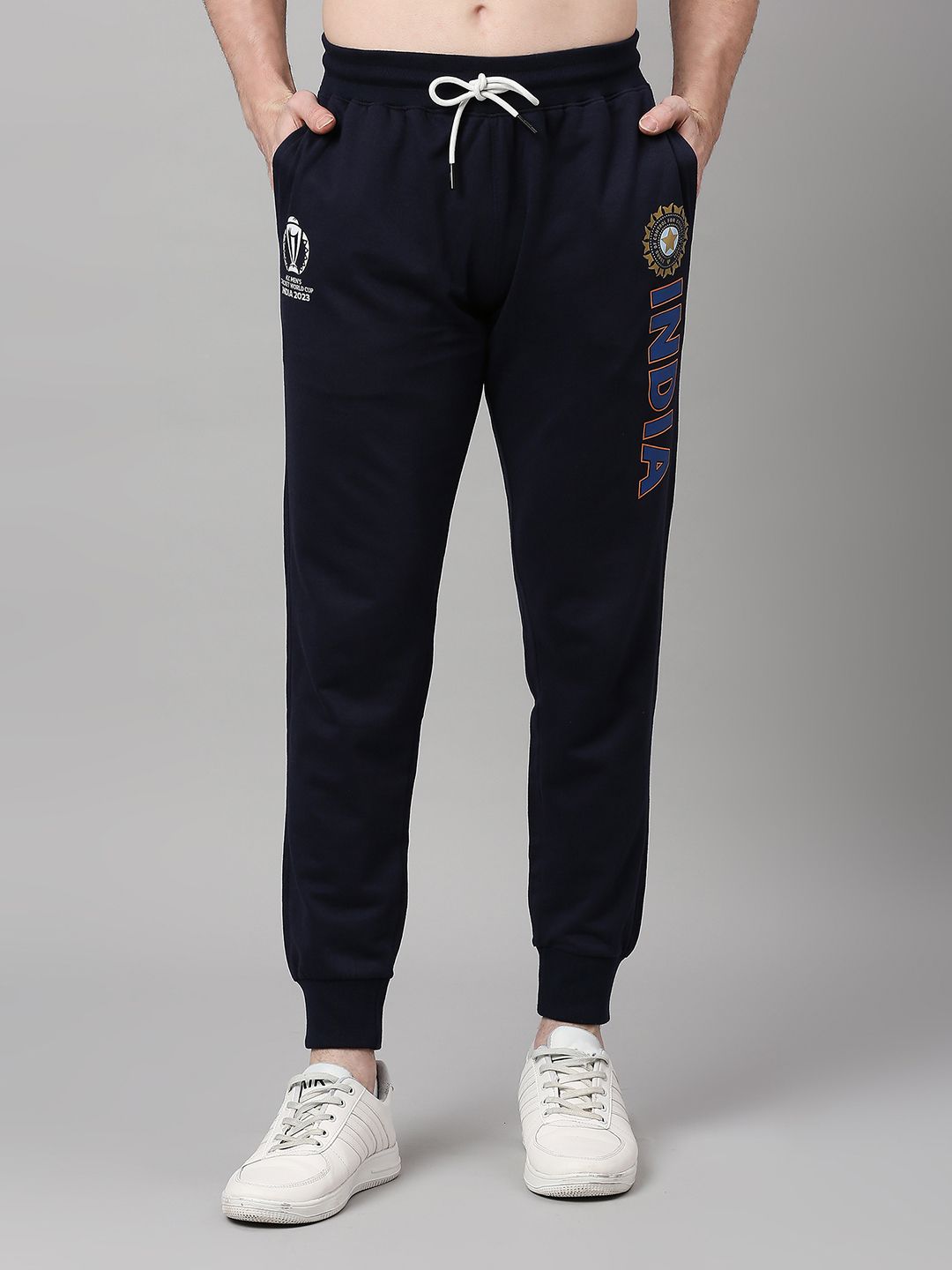 Buy Official ICC CWC-23 Men Navy Blue Solid Jogger from FanCode Shop.