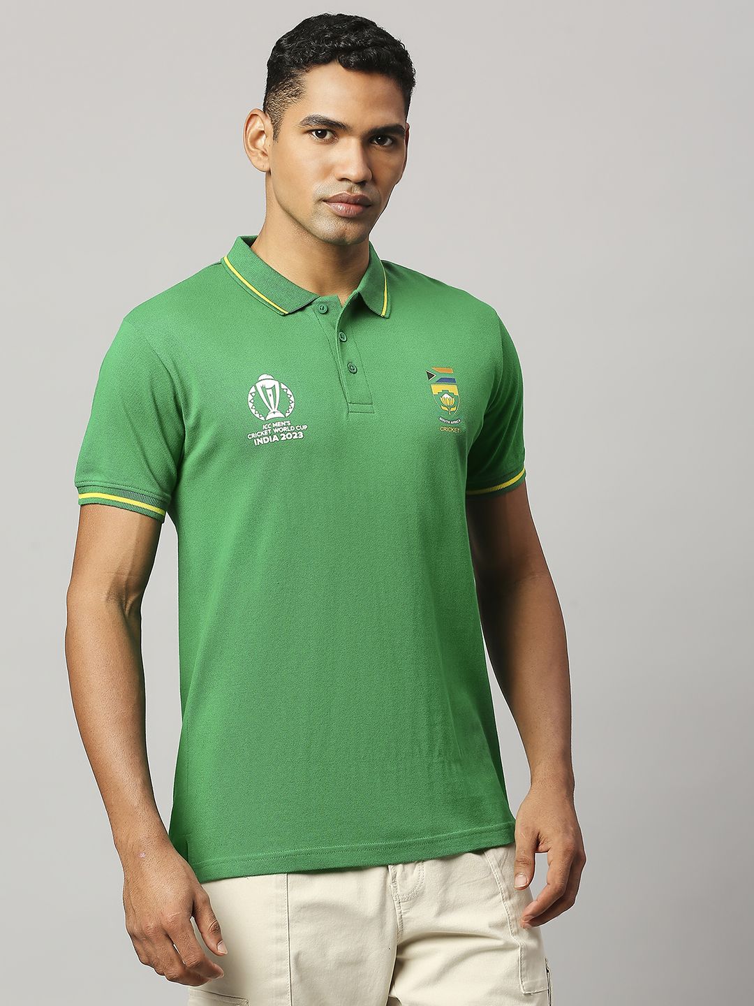 Buy Official ICC CWC-23 Men Green Solid Short Sleeves Polo Collar T ...