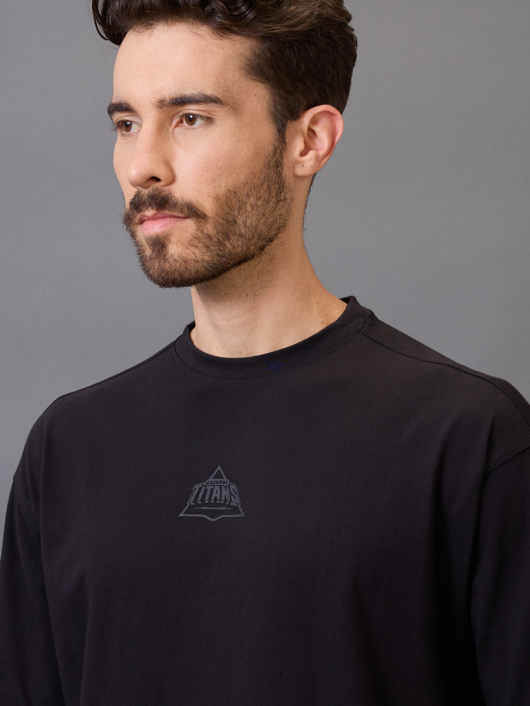 Gujarat Titans Men Black Graphic Printed Half Sleeves Round Neck Oversized Cotton T-Shirt (2)