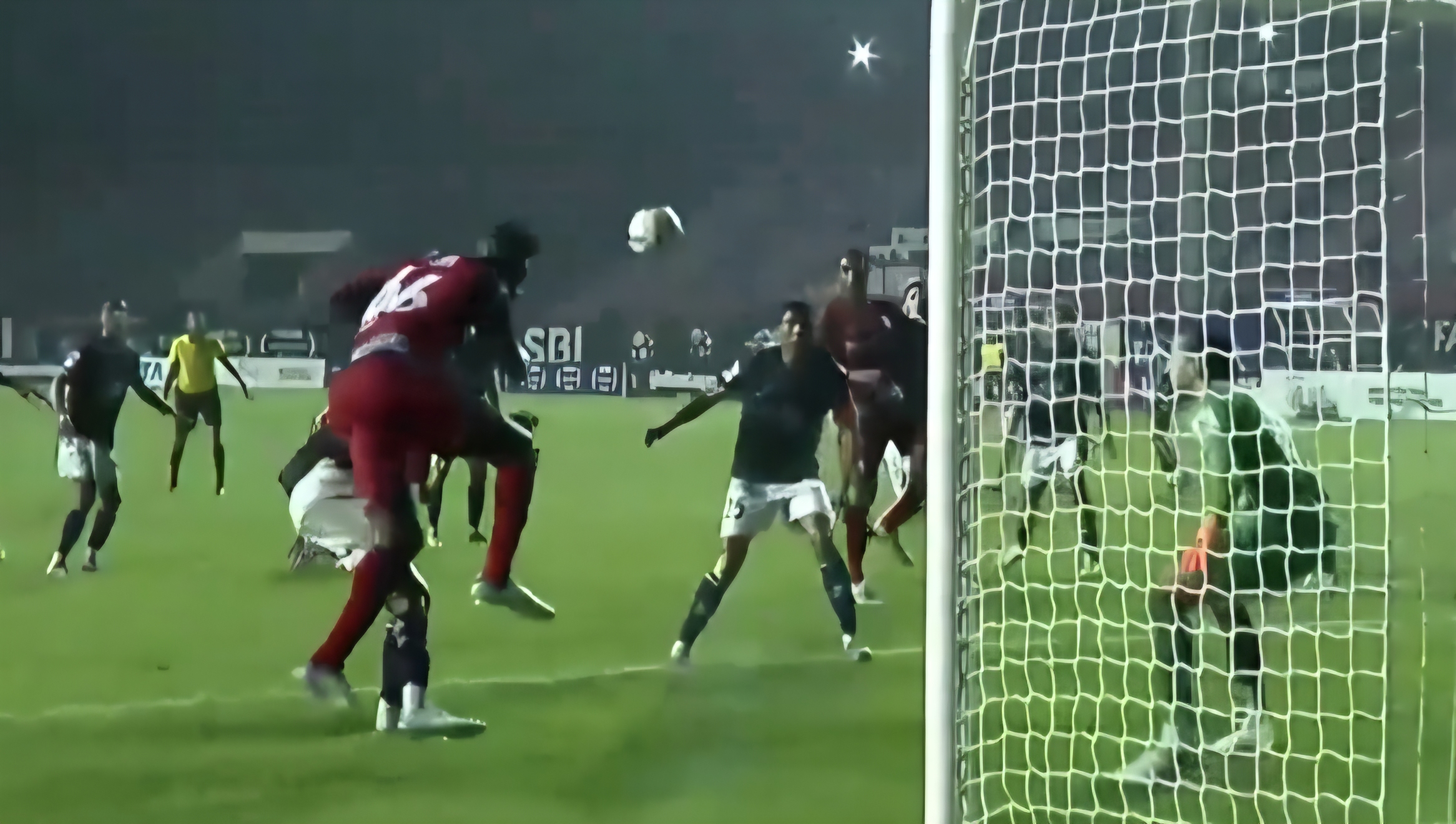 TOWERING STRIKE! Eze rises high for a crucial finish