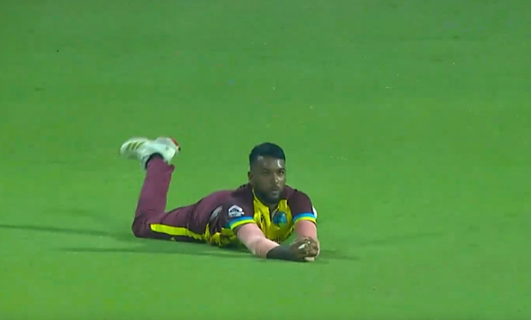 VALIANT! Navin Bidaisee plunged ahead for a stunner