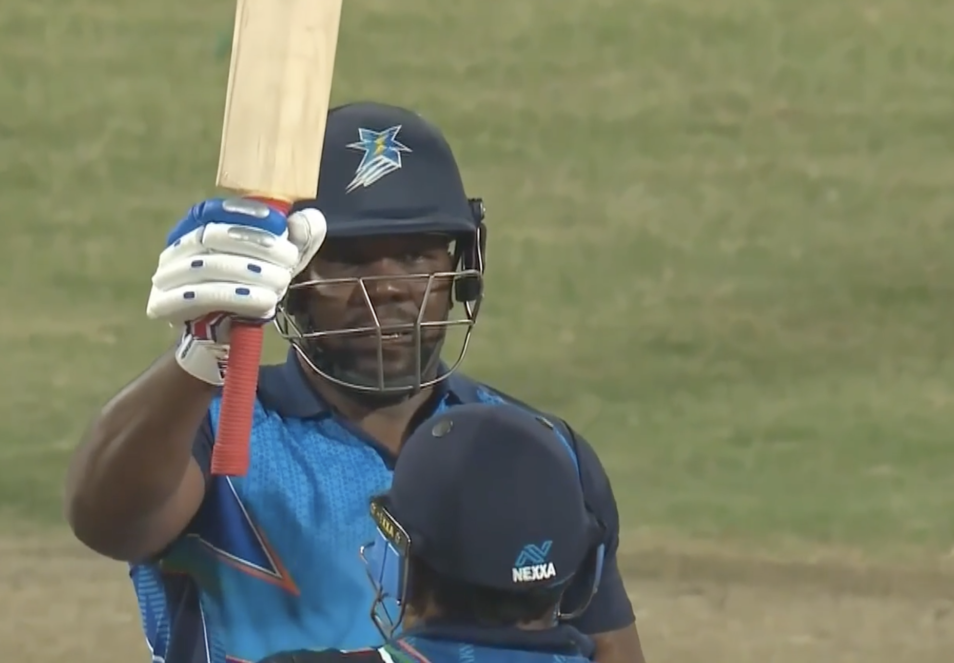 CLOBBERED! Hamilton Masakadza brings up his fifty in style