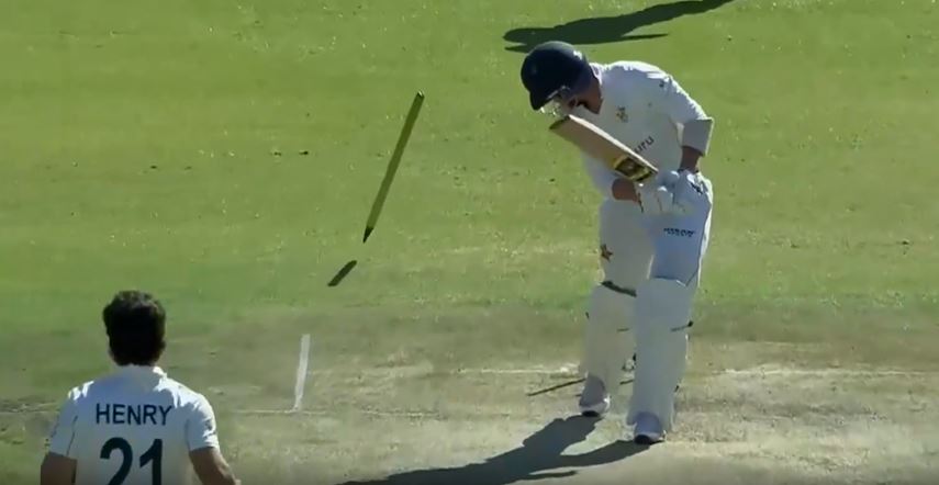 UPROOTED! Matt Henry sent the off stump flying