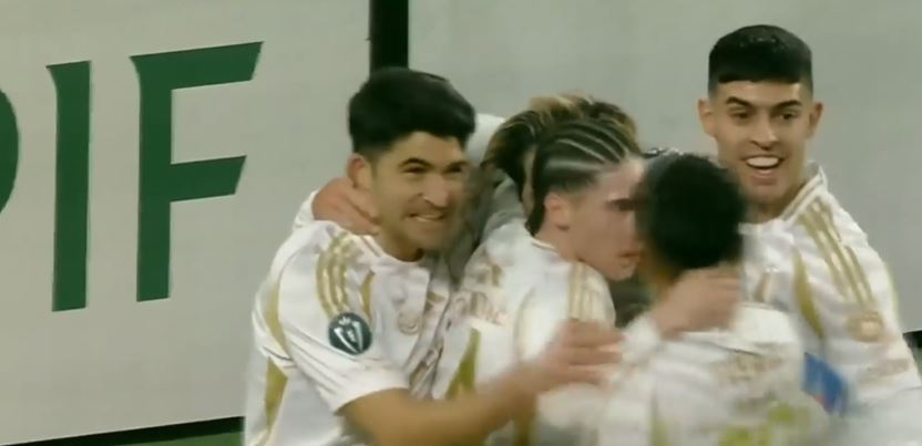 Towering Header! Nicolas Ibanez rose high for a dazzling goal