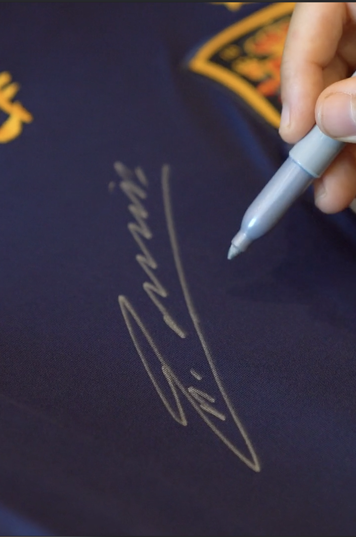 Signed Under the Dubai Lights