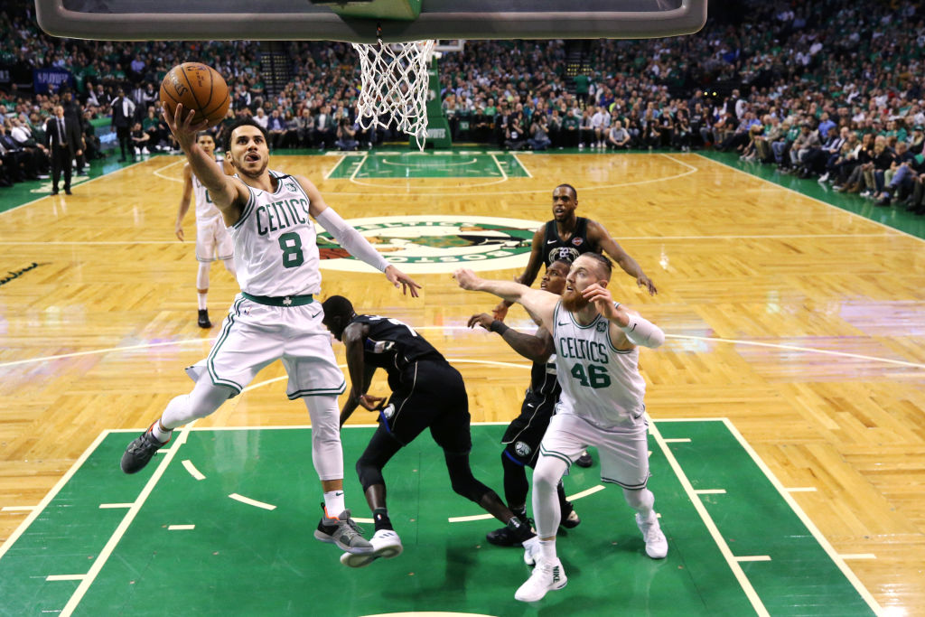Holiday leads Bucks past Kings
