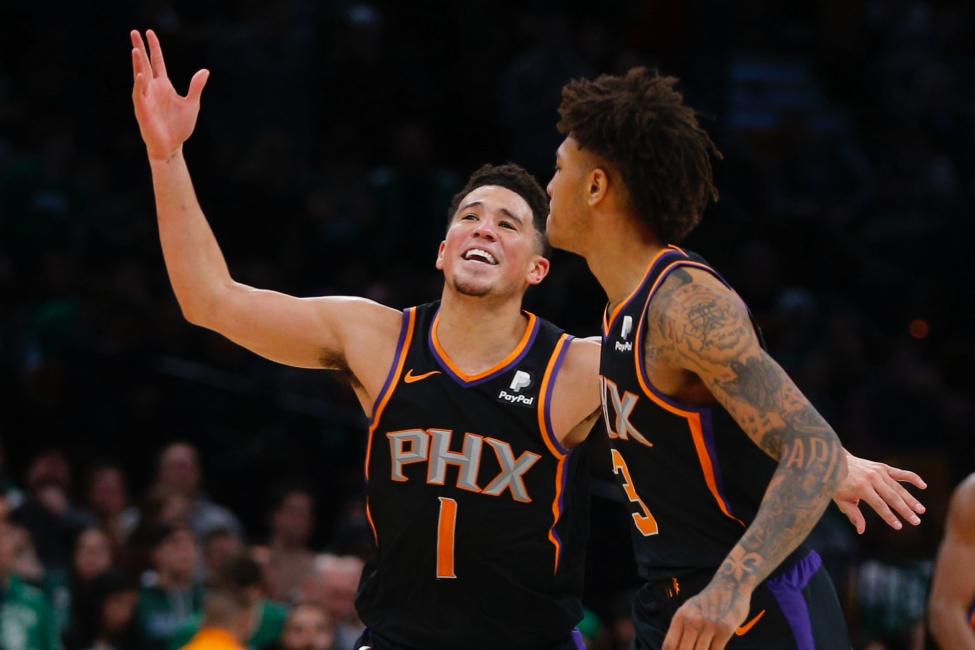 Paul, Booker shine as Suns topple Jazz in OT