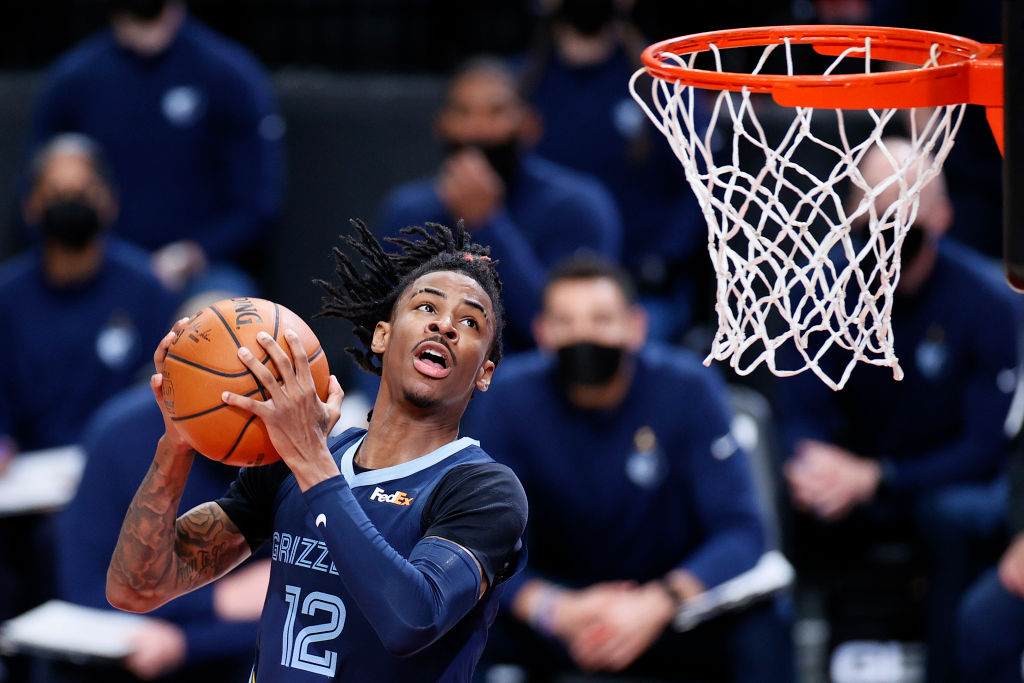 Morant helps Grizzlies beat Warriors in OT