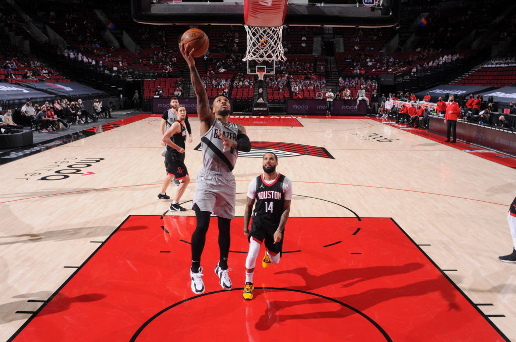 Lillard pours in 34 as Trail Blazers blast Rockets 140-129
