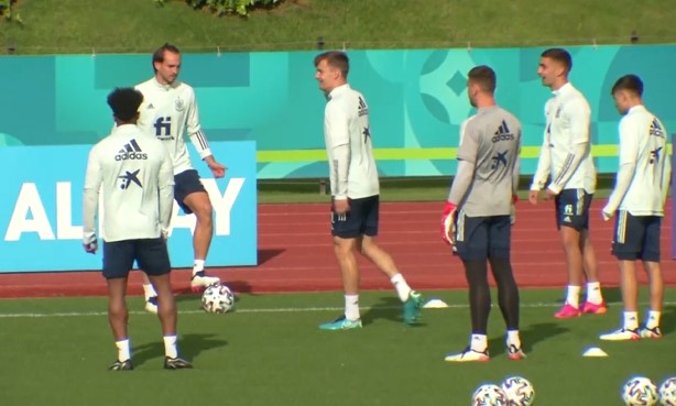 Underfire Morata finds net during training session