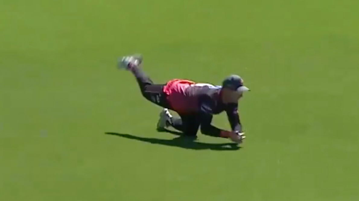 STUNNER! Henry Cooper takes a diving catch