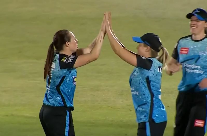 3 for 16! Megan Schutt delivers with the ball